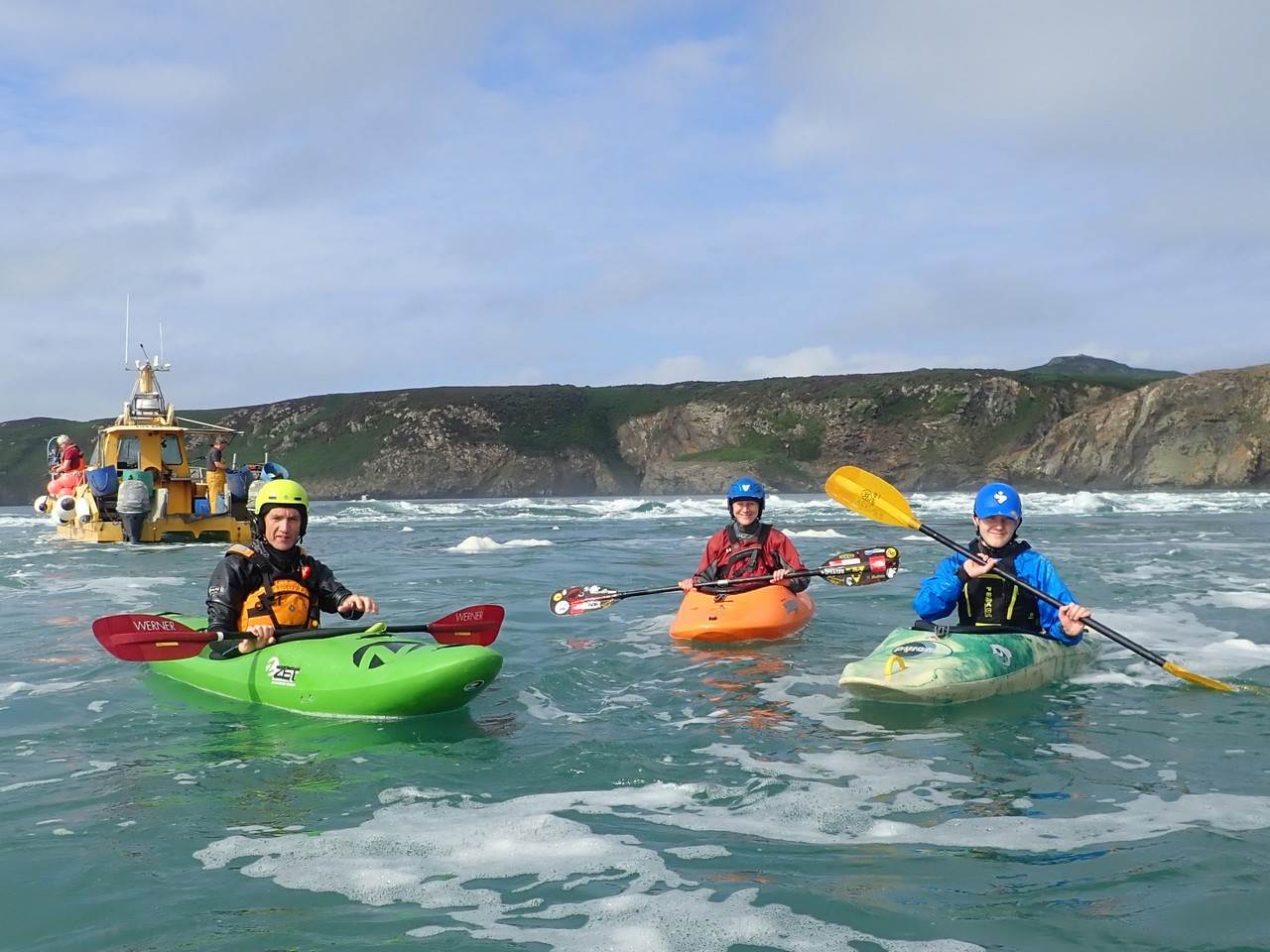 A group of people in kayaks

Description automatically generated with medium confidence