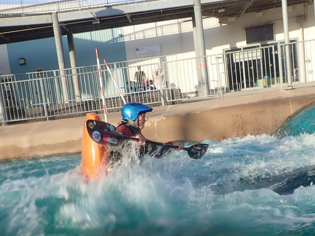 A picture containing water, outdoor, water sport, swimming

Description automatically generated