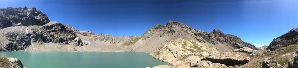 A body of water with mountains in the back

Description automatically generated with low confidence