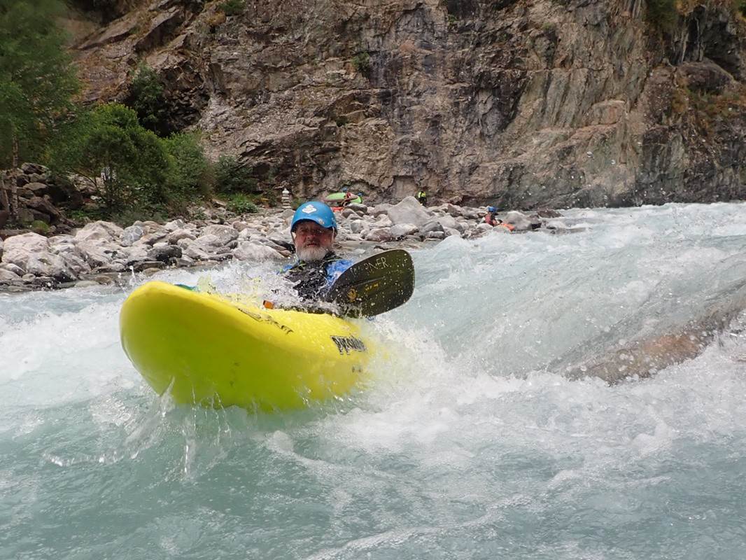 A picture containing outdoor, water, person, watercraft

Description automatically generated