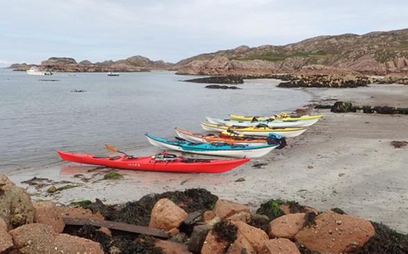 A group of boats on a beach

Description automatically generated with low confidence