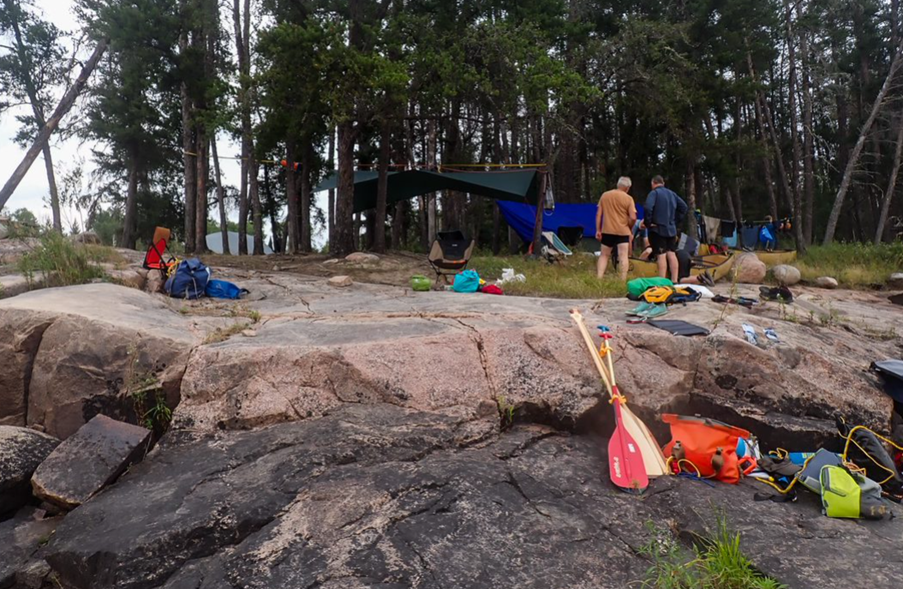 People camping on a rocky area

Description automatically generated with medium confidence