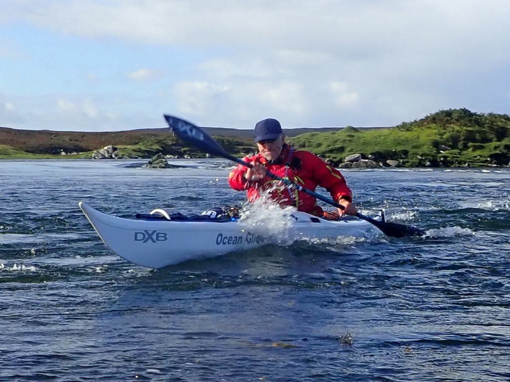 A person in a kayak

Description automatically generated