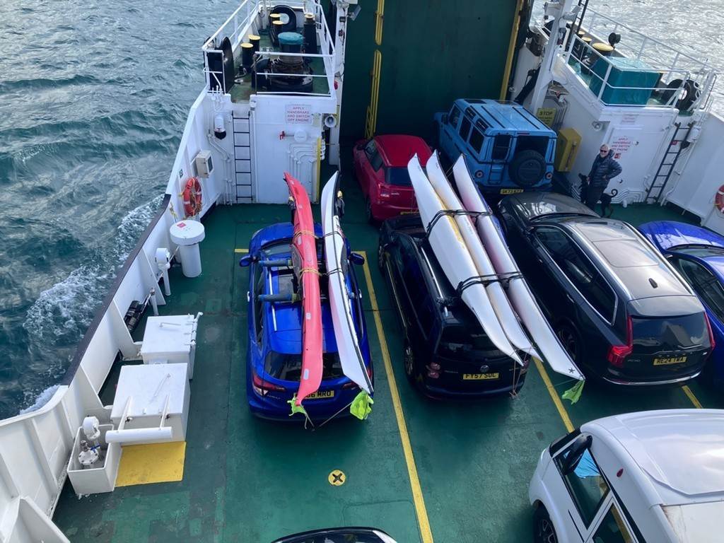 A car on a ferry

Description automatically generated