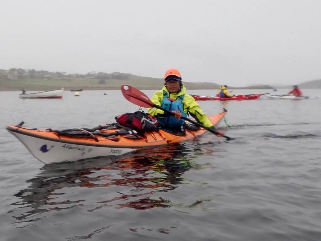 A person in a kayak

Description automatically generated