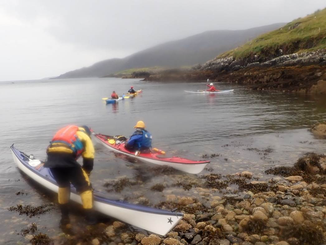 People kayakers in the water

Description automatically generated