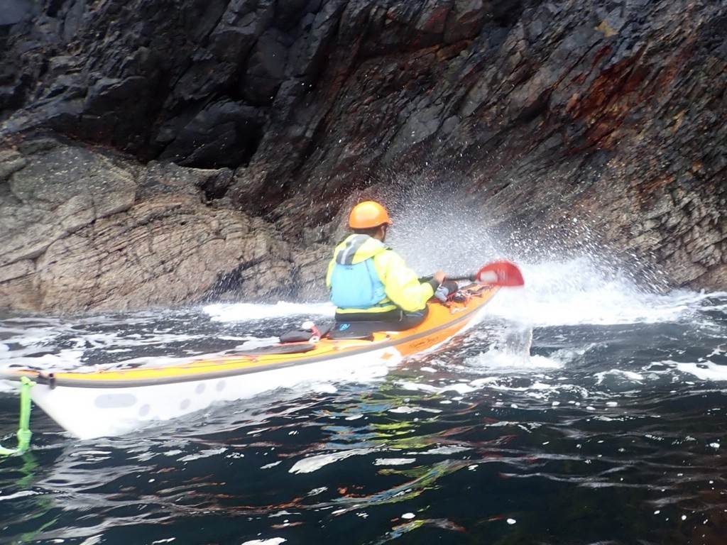 A person in a kayak

Description automatically generated