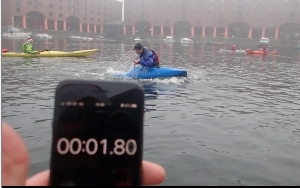 A picture containing text, water, outdoor, boat Description automatically generated