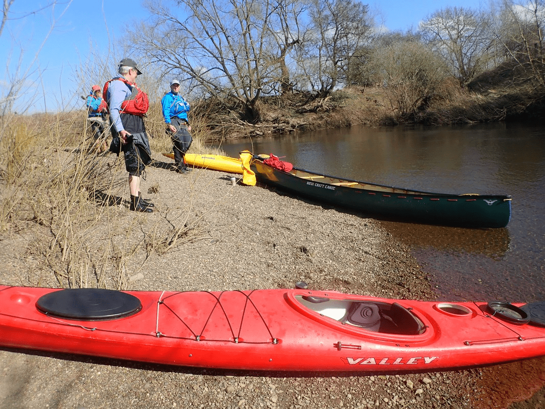 A picture containing outdoor, red, boatDescription automatically generated