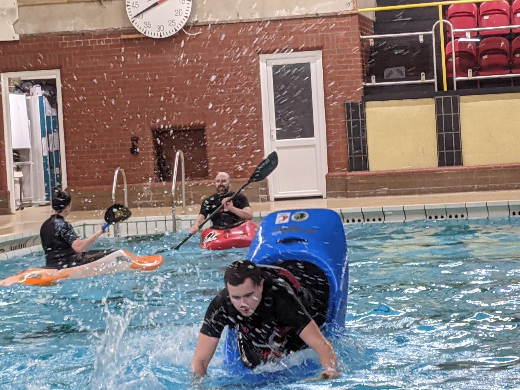 May be an image of 4 people and body of water