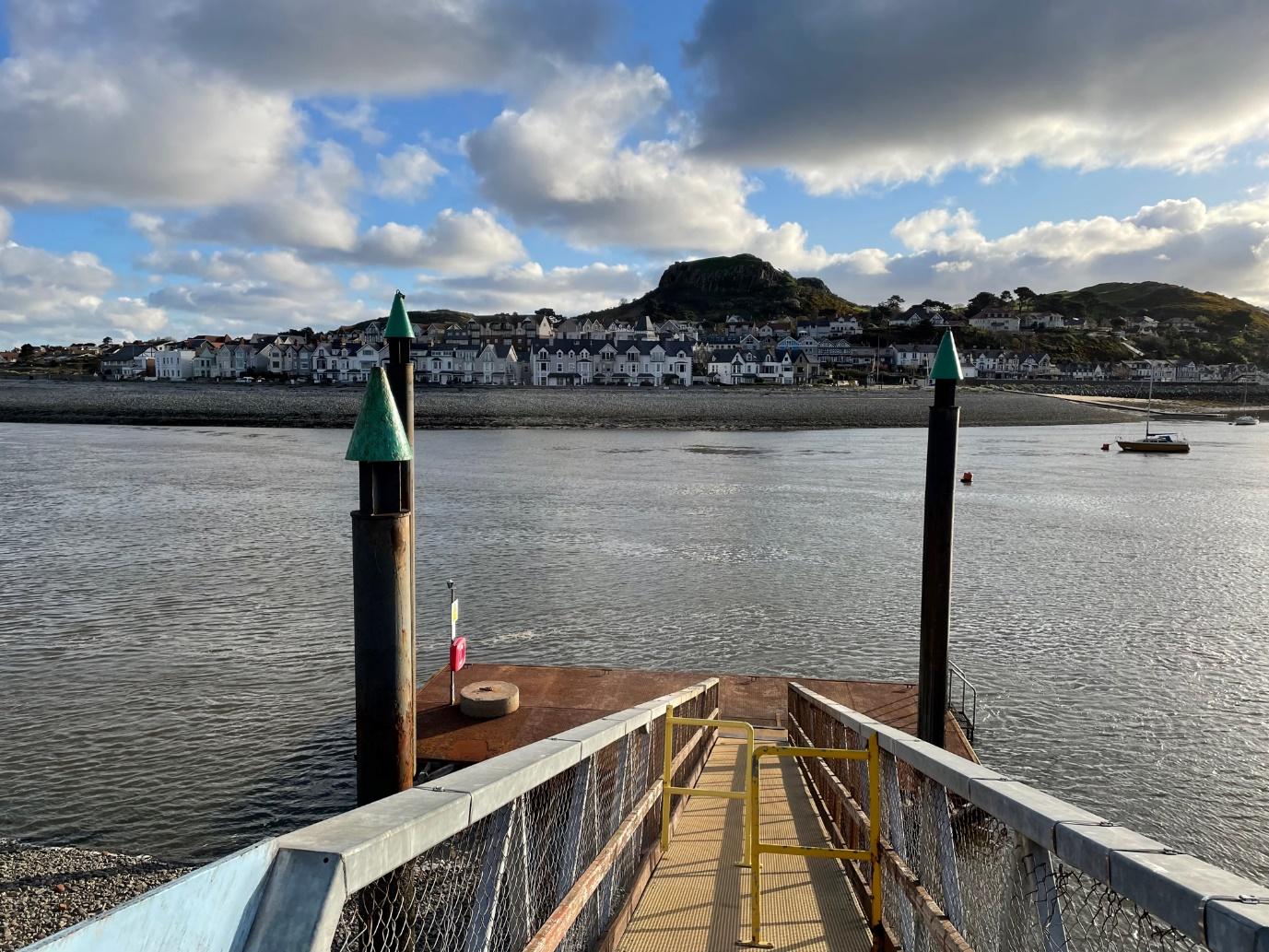 A picture containing sky, water, outdoor, riverDescription automatically generated