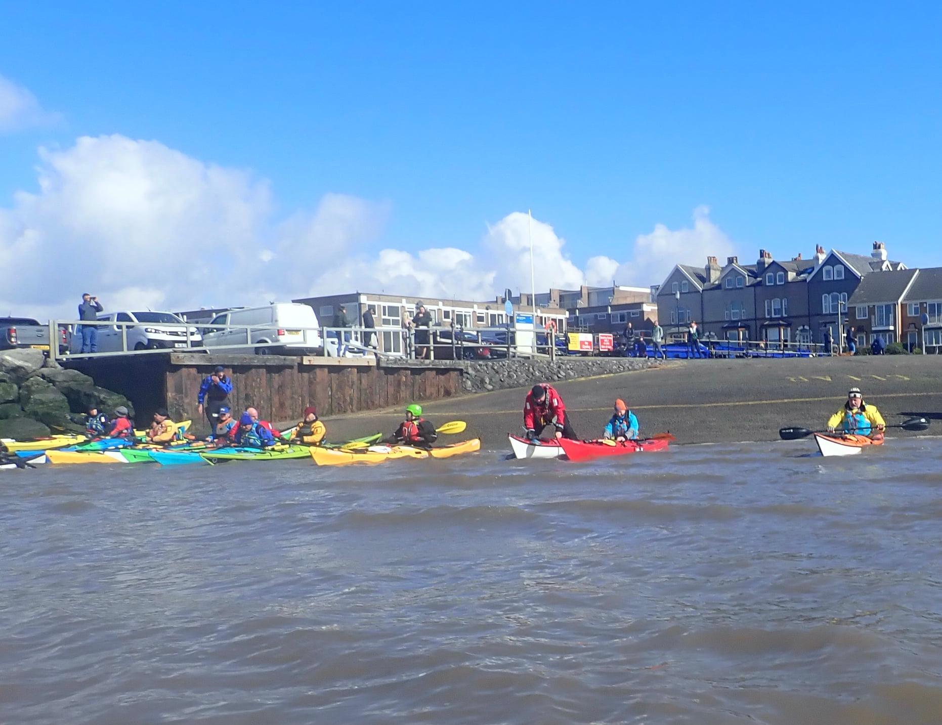 May be an image of 7 people and body of water