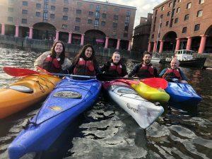 A picture containing building, outdoor, watercraft, transport Description automatically generated