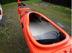 A picture containing grass, outdoor, helmetDescription automatically generated