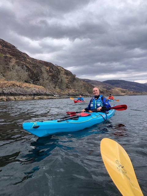 A picture containing sky, outdoor, water, mountainDescription automatically generated