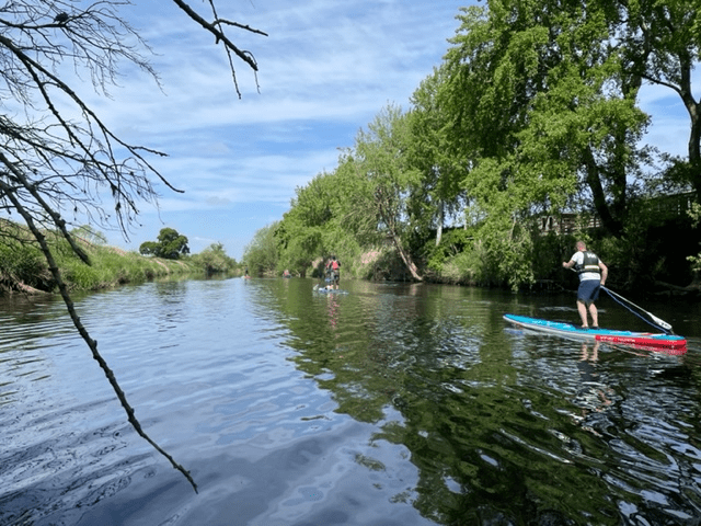 A picture containing tree, outdoor, water, riverDescription automatically generated