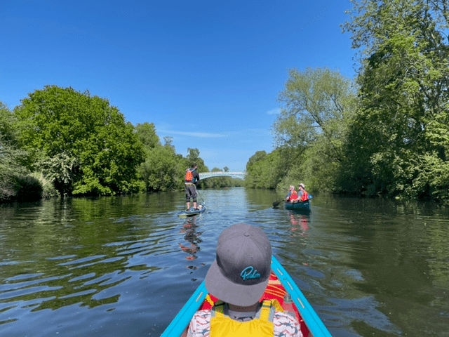 A picture containing water, tree, outdoor, boatDescription automatically generated