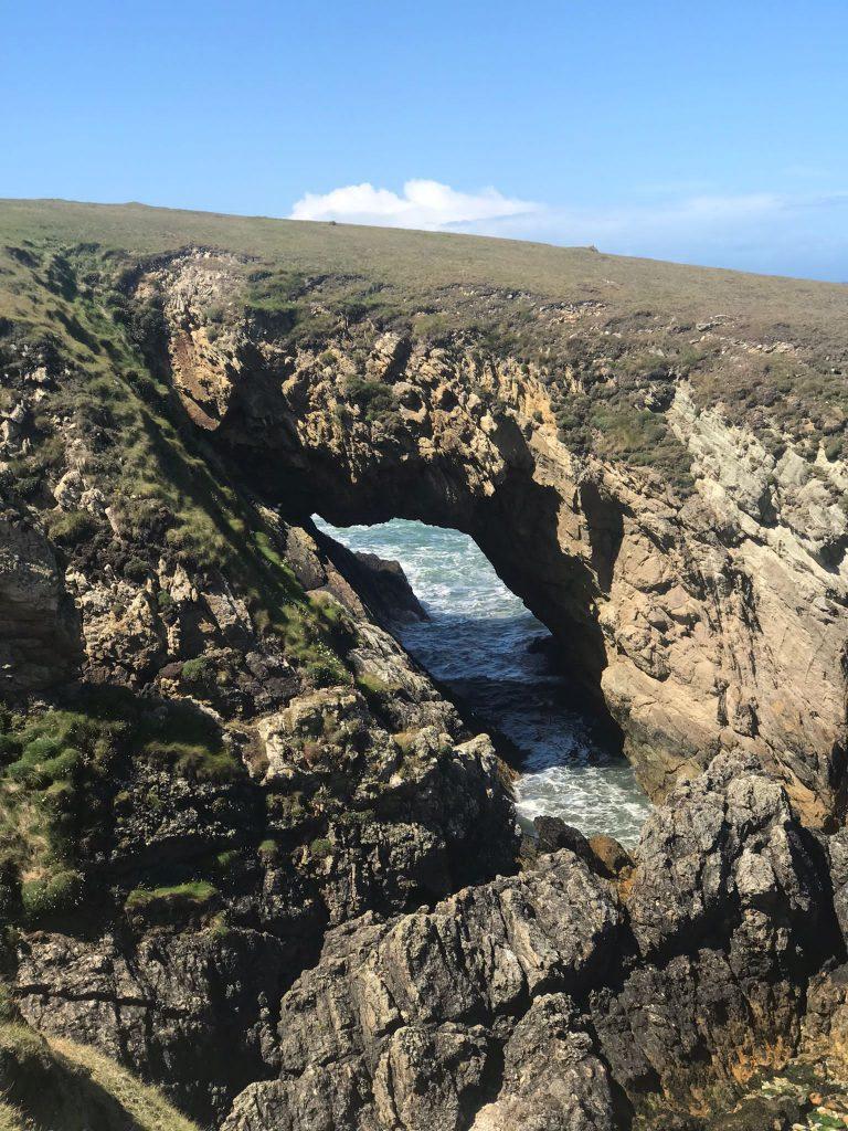 A picture containing rock, outdoor, sky, mountain Description automatically generated