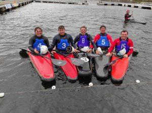 May be an image of 6 people, people standing and body of water
