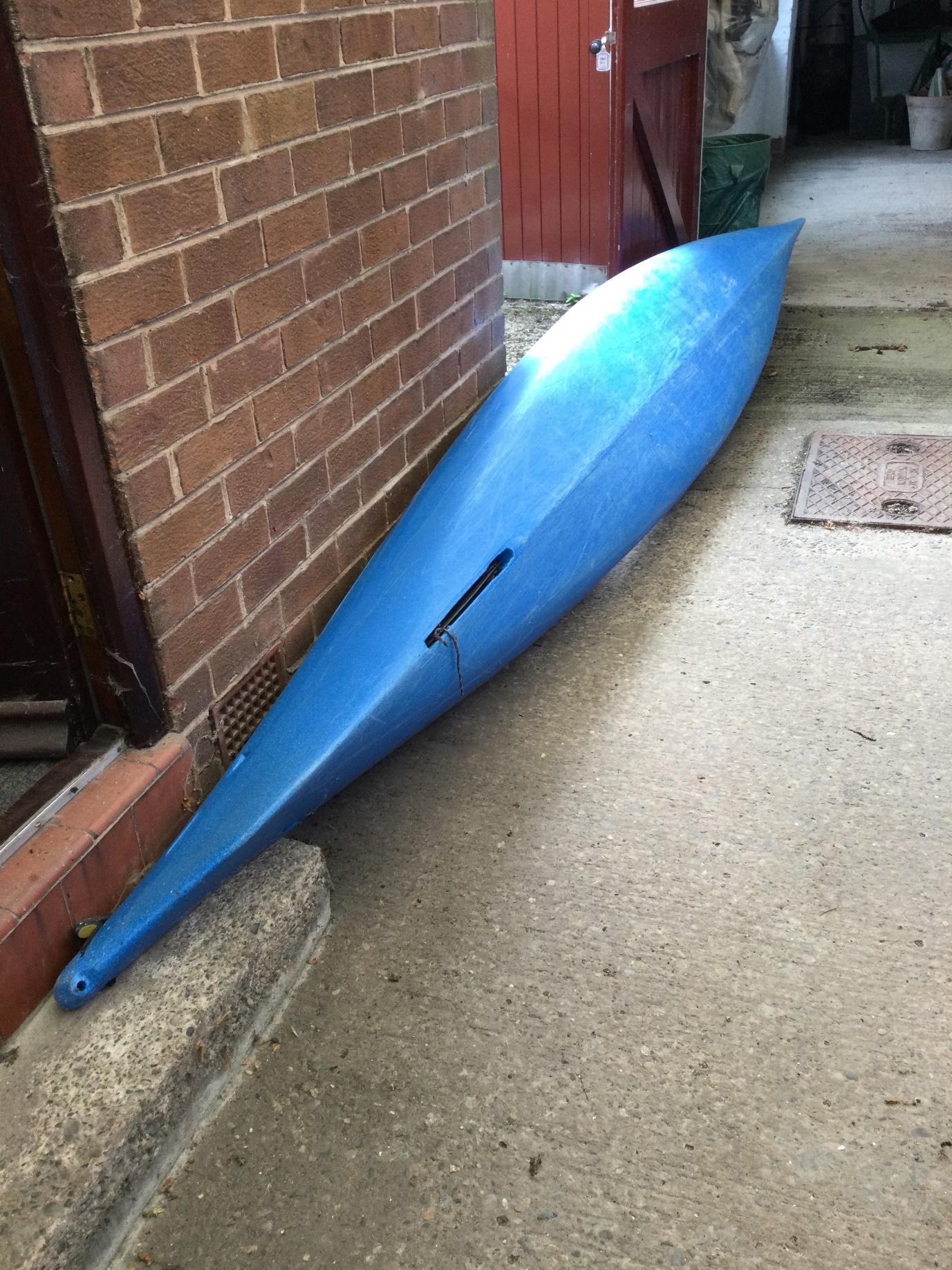 A picture containing ground, building, outdoor, blueDescription automatically generated