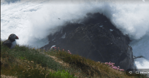 A picture containing outdoor, grass, hill, mountain Description automatically generated