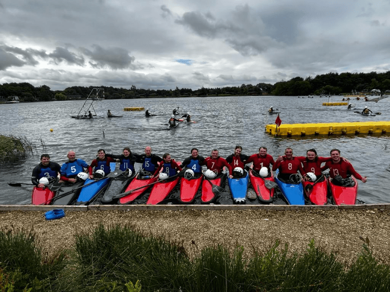 A picture containing sky, grass, outdoor, water Description automatically generated