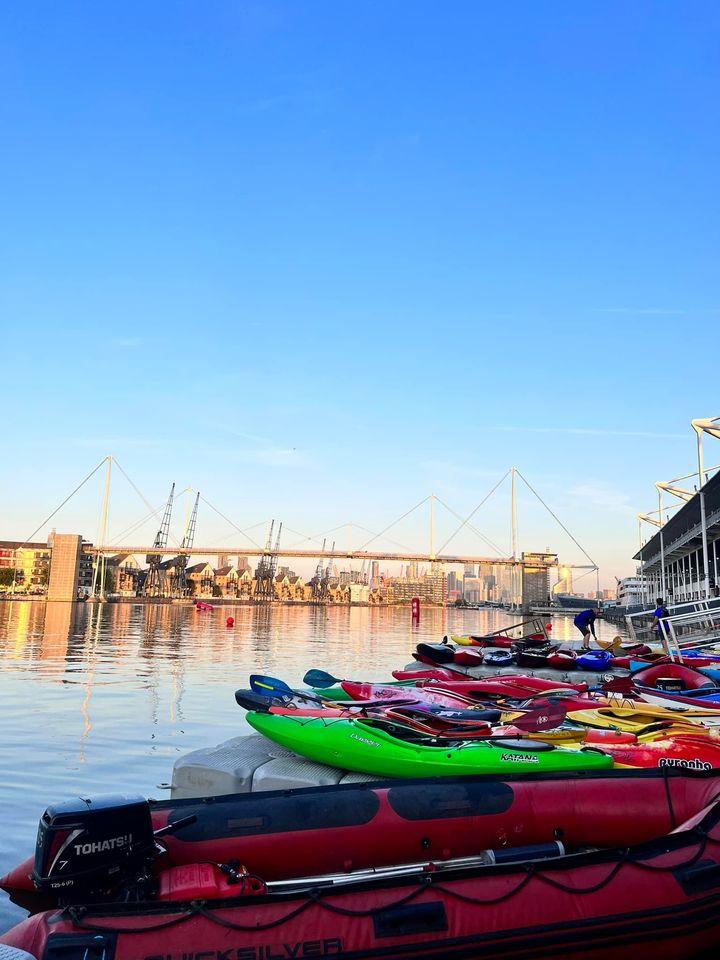 A picture containing outdoor, sky, harbor, colorfulDescription automatically generated