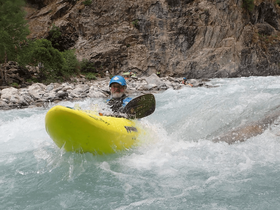 A picture containing outdoor, water, person, watercraftDescription automatically generated