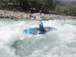 A picture containing outdoor, water, surfing, water sport Description automatically generated