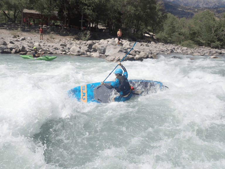 A picture containing outdoor, water, surfing, water sport Description automatically generated