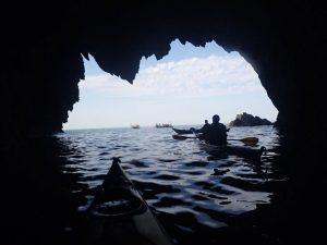 A picture containing water, outdoor, nature, cave Description automatically generated