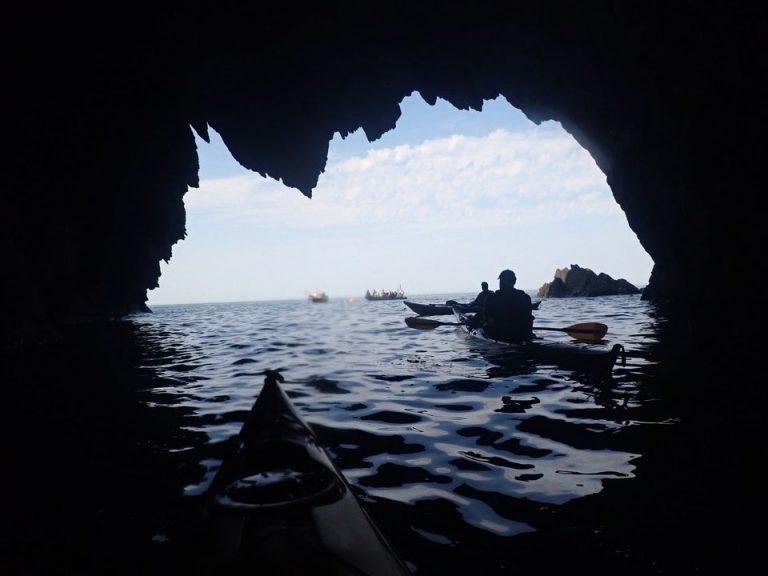 A picture containing water, outdoor, nature, cave Description automatically generated