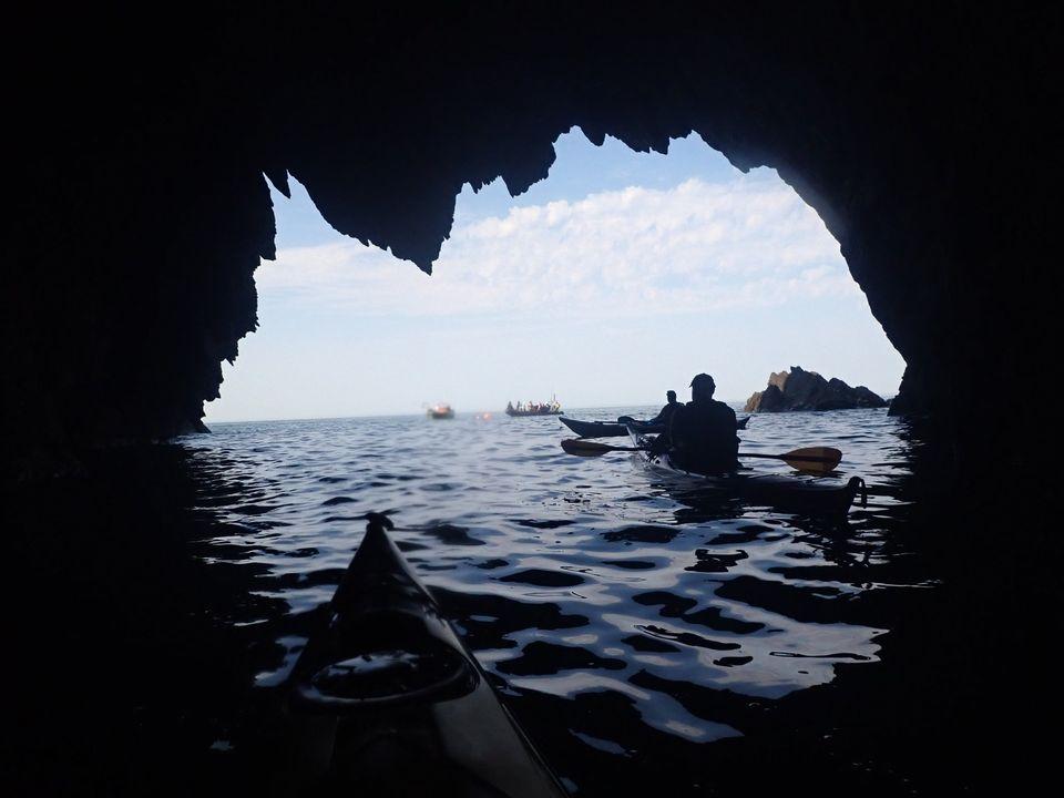 A picture containing water, outdoor, nature, cave

Description automatically generated