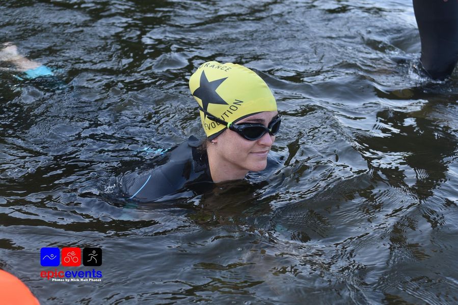 A picture containing water, outdoor, person, sportDescription automatically generated