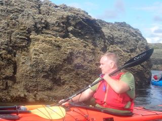 A person in a kayakDescription automatically generated with medium confidence