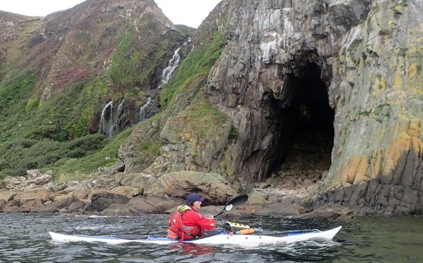 A picture containing outdoor, mountain, water, rockDescription automatically generated