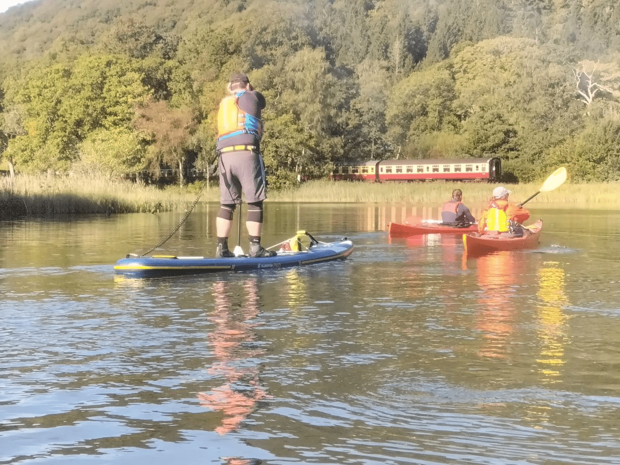 A picture containing outdoor, water, sportDescription automatically generated