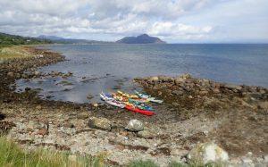 A picture containing sky, outdoor, grass, water Description automatically generated