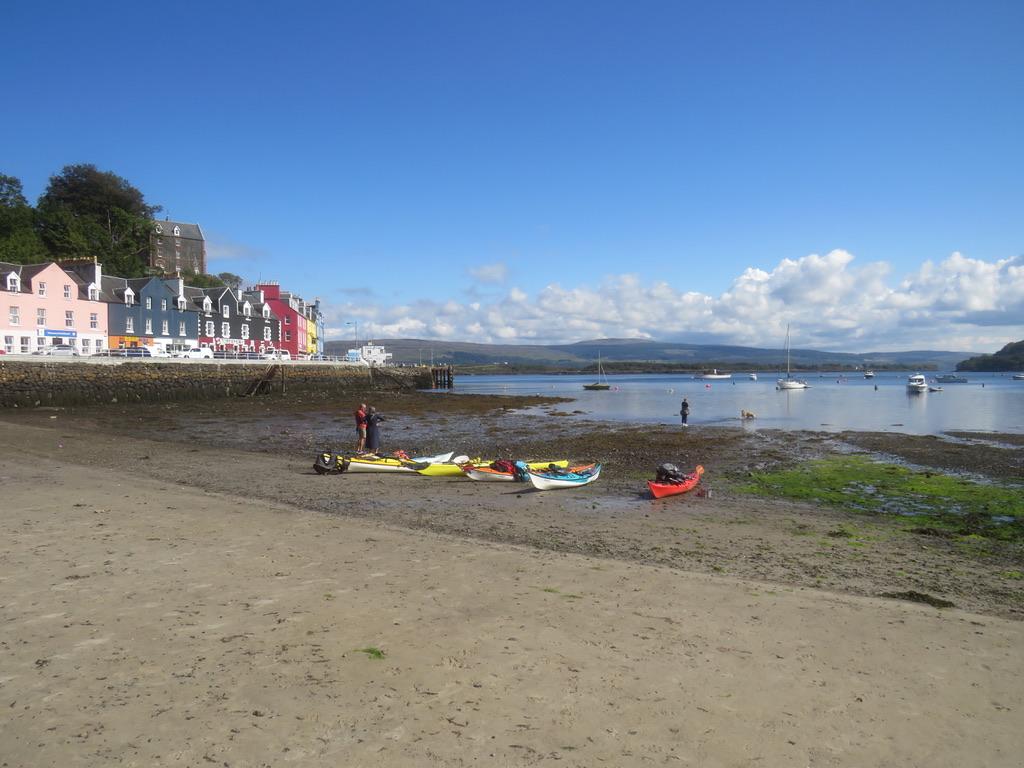 A picture containing sky, outdoor, water, beach

Description automatically generated