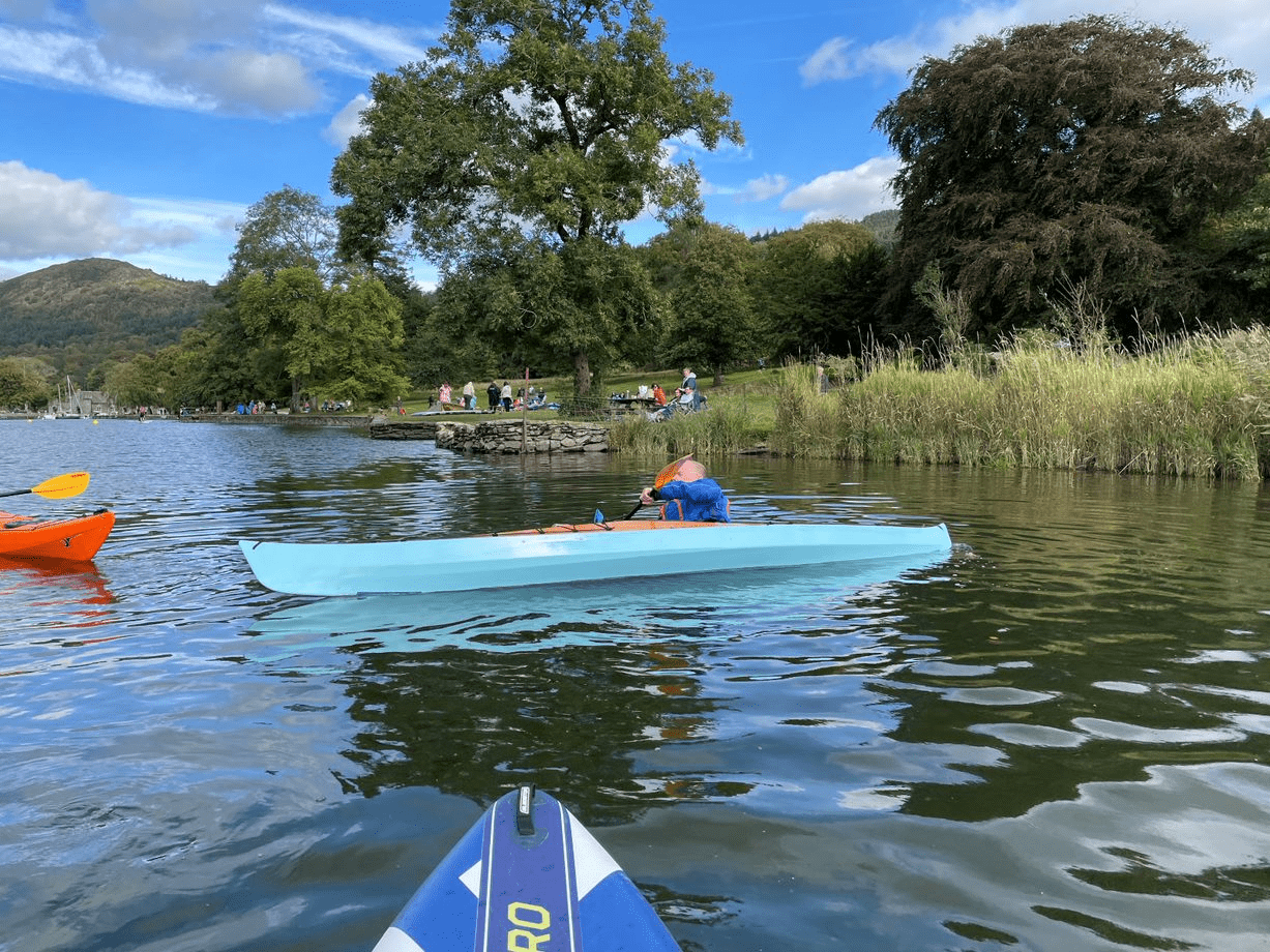 A picture containing water, tree, outdoor, lakeDescription automatically generated