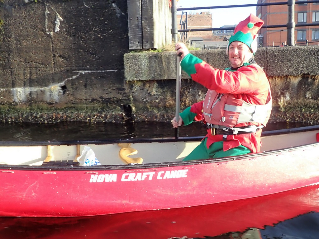 A person in a red boatDescription automatically generated with low confidence