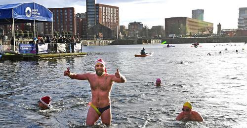 Swimmers brave cold waters as annual Boxing Day swim returns