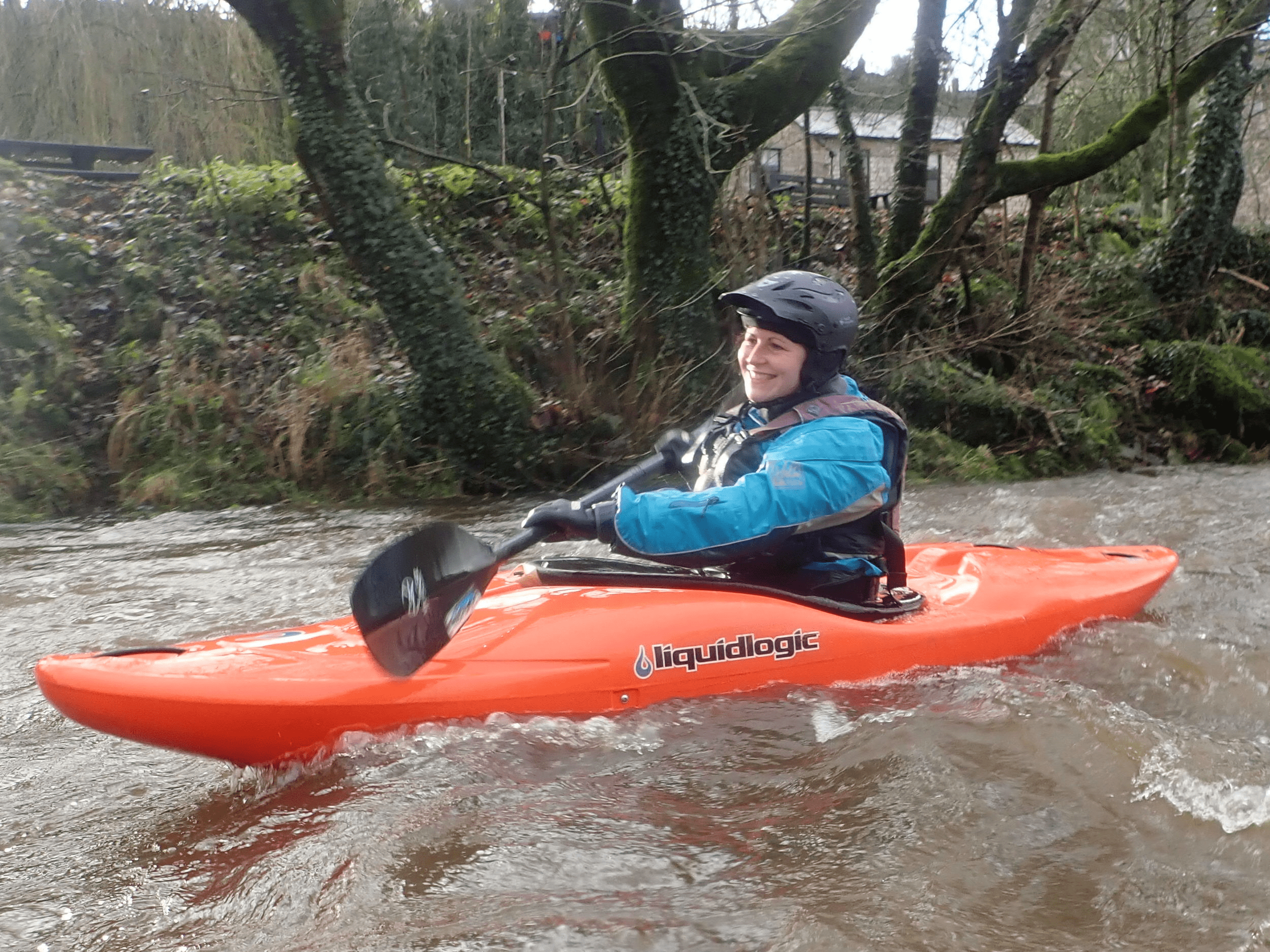 A person in a kayak in a riverDescription automatically generated with low confidence