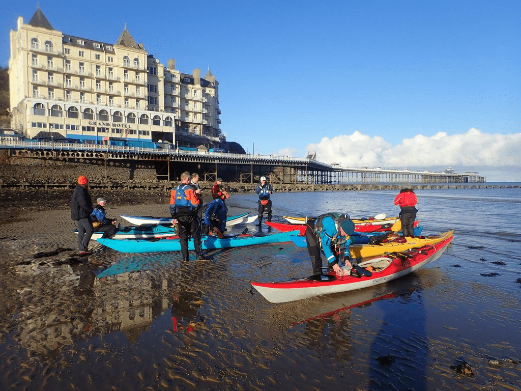A picture containing sky, water, outdoor, boatDescription automatically generated