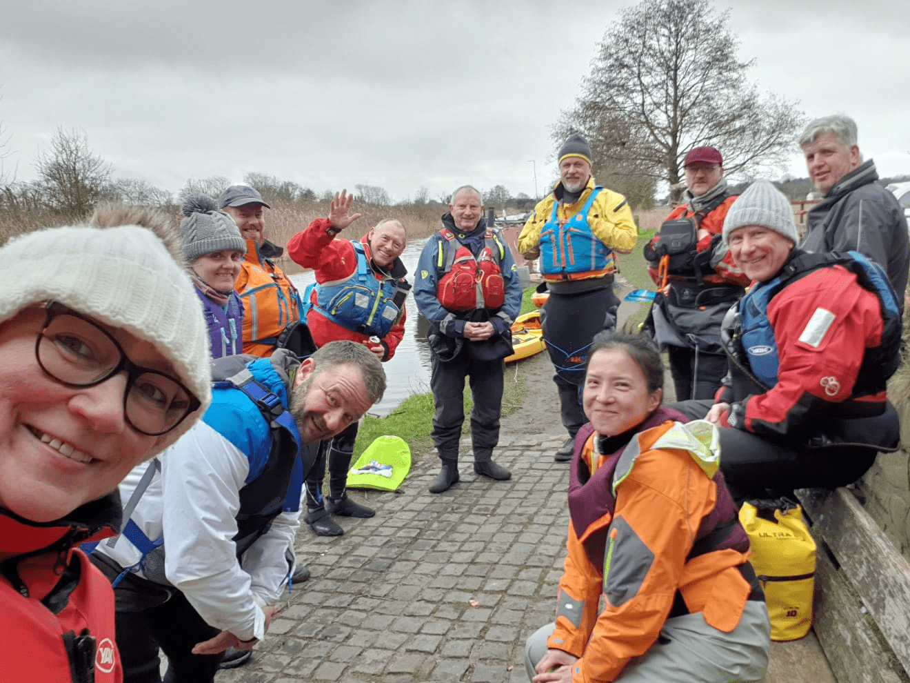 A group of people outsideDescription automatically generated with medium confidence