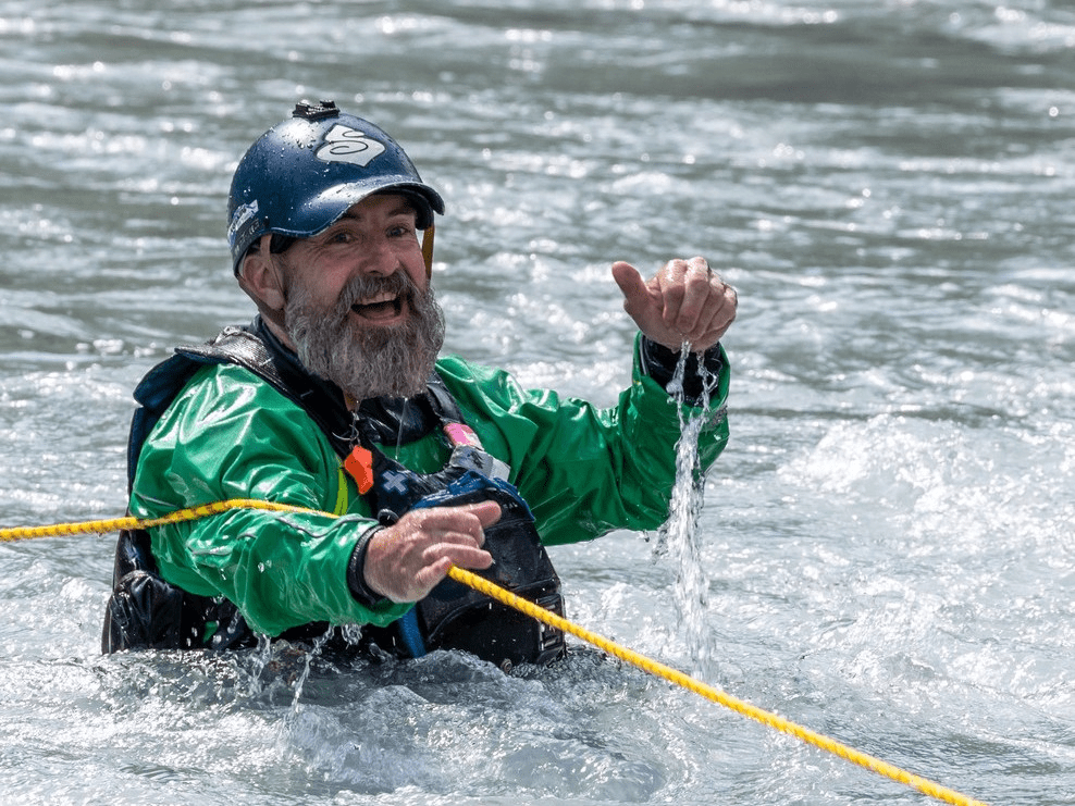 A picture containing outdoor, water, person, personDescription automatically generated