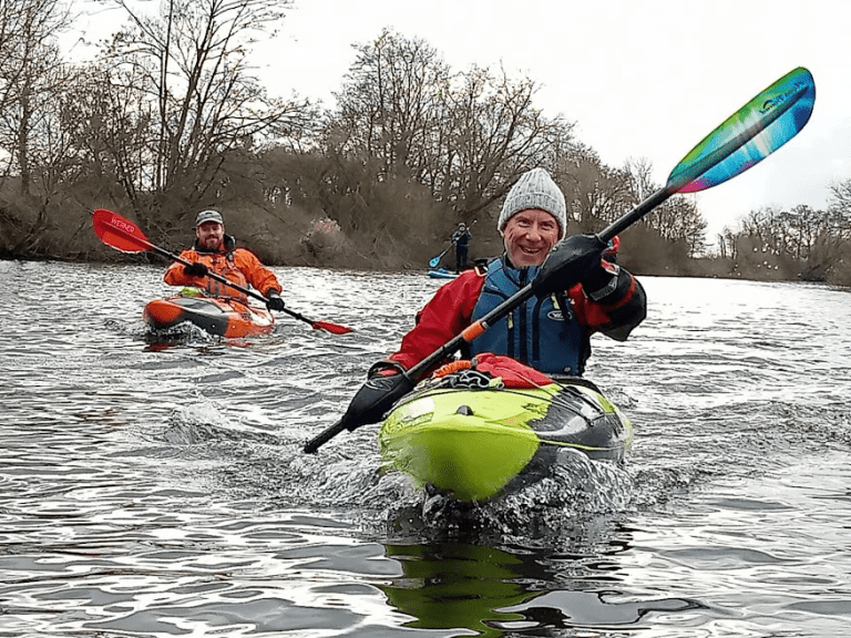 A picture containing water, outdoor, tree, sport Description automatically generated