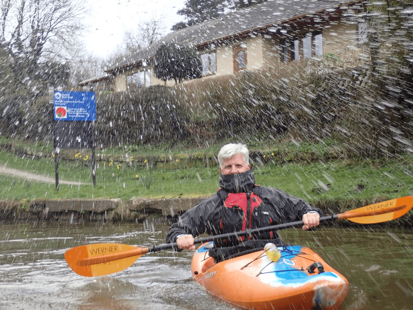 A person in a kayakDescription automatically generated with low confidence