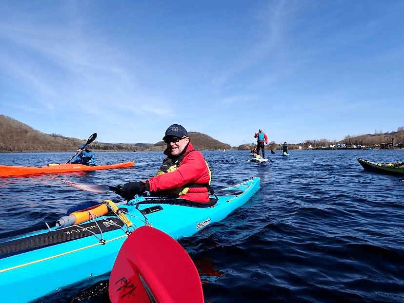 A person in a kayak
Description automatically generated with low confidence