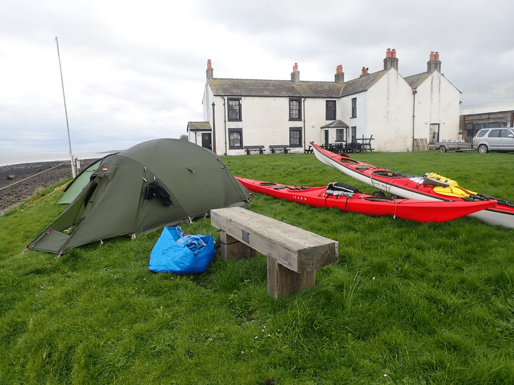 A picture containing grass, sky, outdoor, red

Description automatically generated